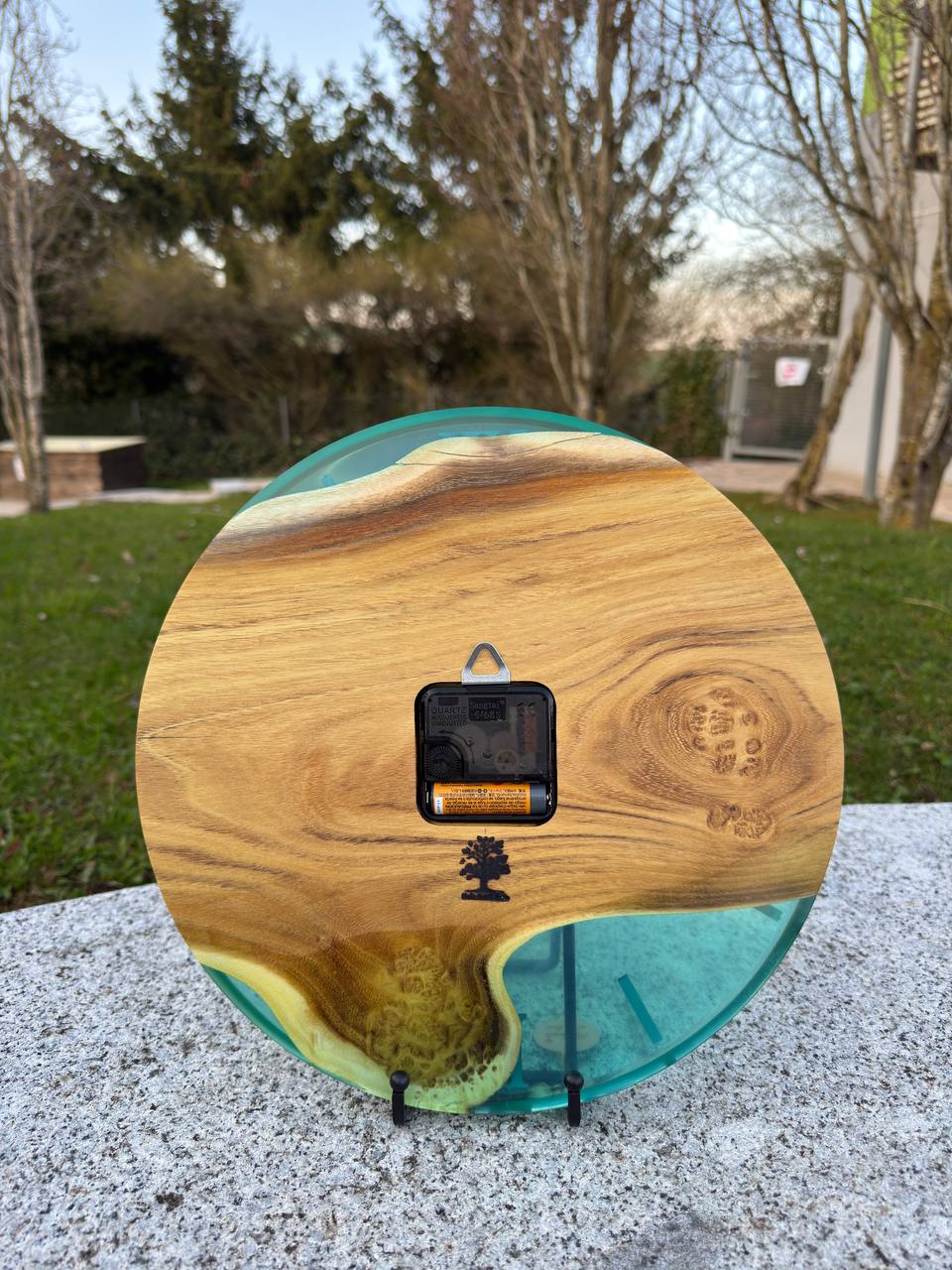 Blue Lagoon – Wall clock made of robinia wood with burls and transparent epoxy resin