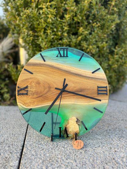 Blue Lagoon – Wall clock made of robinia wood with burls and transparent epoxy resin